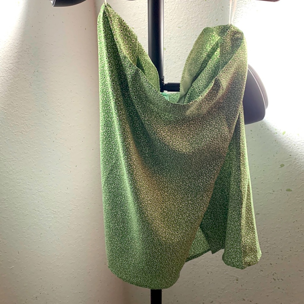 Green with white and black flowered mini skirt that I sometimes wore is the top